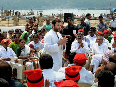 Rahul Gandhi interacting with Kolis in Mumbai. PTI