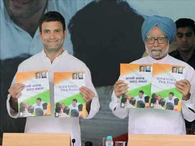Rahul Gandhi and Manmohan Singh releasing the manifesto. PTI