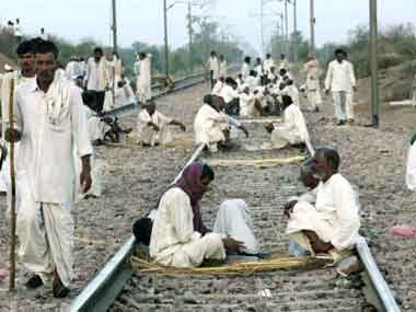 Jat activists disrupt rail traffic seeking job reservation Jat activists disrupt rail traffic seeking job reservation