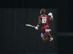 West Indies’ Darren Sammy leaps to celebrate after the West Indies won their second T20I against England at Kensington Oval. REUTERS
