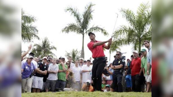 Back spasms force defending champ Tiger Woods to pull out of Bay Hill 