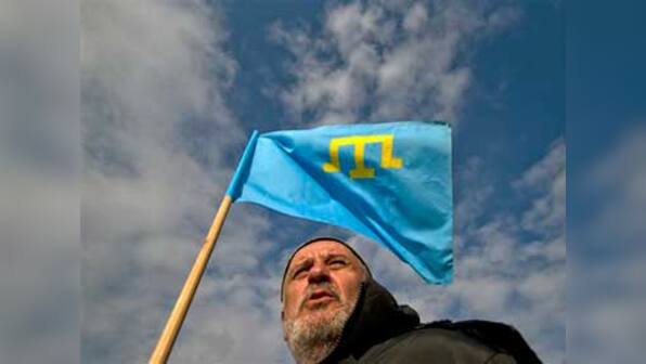 In Crimea, people unsure over whether to stay or move