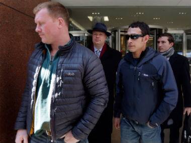 James Brady, and Andrew Rossig, foreground left and right, two parachutists who jumped from One World Trader Center in September 2013 in this file photo. AP 