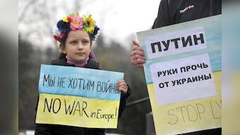 At Ukrainian cliff-top base, shots fired as cements control