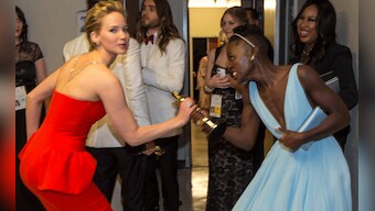 It's all in good fun: JLaw trying to snatch Oscar from Lupita Nyong'o