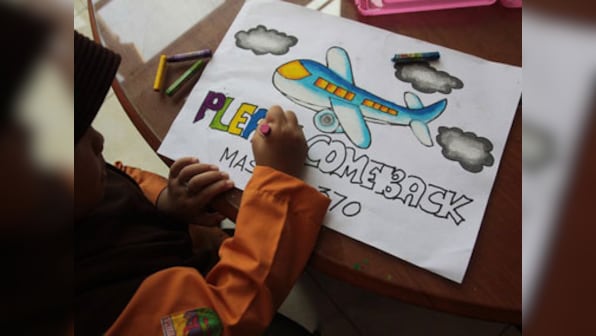 Missing plane: Malaysian police visit house of pilot