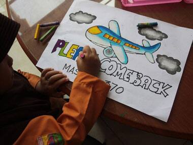 Malaysia crash: Bad weather forces suspension of search ops