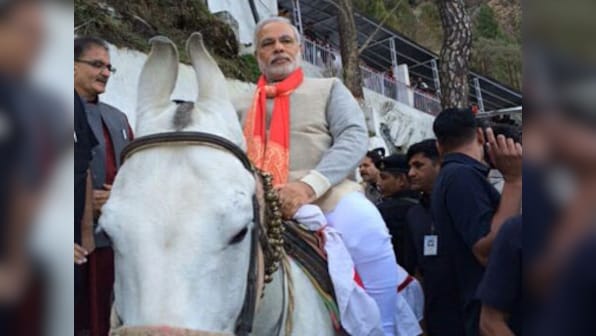 Modi reaches J&K in private jet, rides a horse to Vaishno Devi