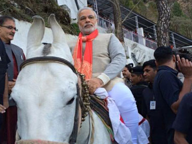 Modi reaches J&K in private jet, rides a horse to Vaishno Devi Modi reaches J&K in private jet, rides a horse to Vaishno Devi