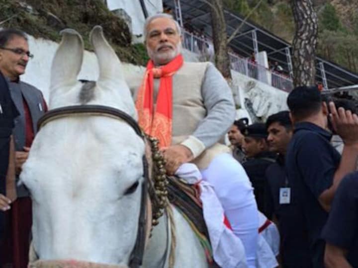 Modi reaches J&K in private jet, rides a horse to Vaishno Devi