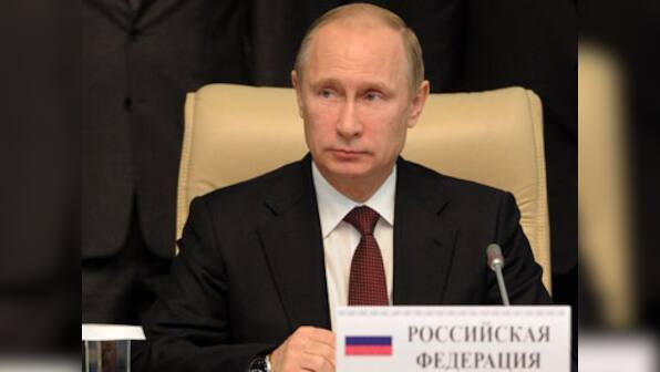 Ukraine seals deal with EU as Putin completes annexation of Crimea 