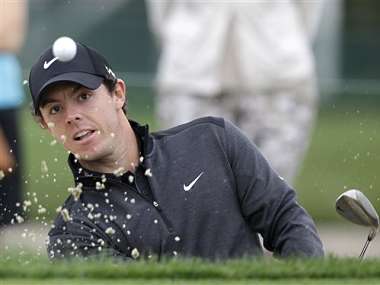 McIlroy soars, and Woods nearly misses the cut McIlroy soars, and Woods nearly misses the cut