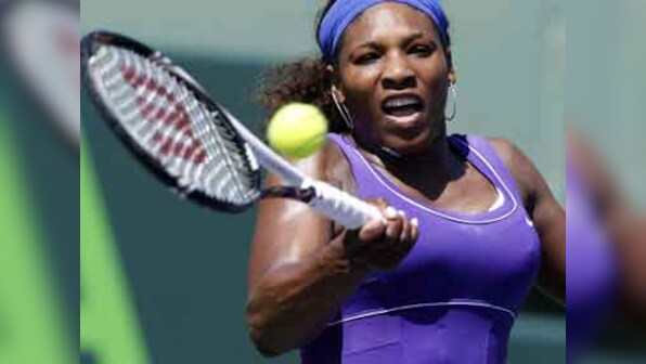 Serena crushes Sharapova to set up Miami final with Li Na
