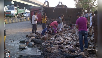 Truck carrying huge amount of country liquor overturns in Mumbai