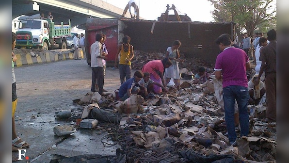 Truck carrying huge amount of country liquor overturns in Mumbai