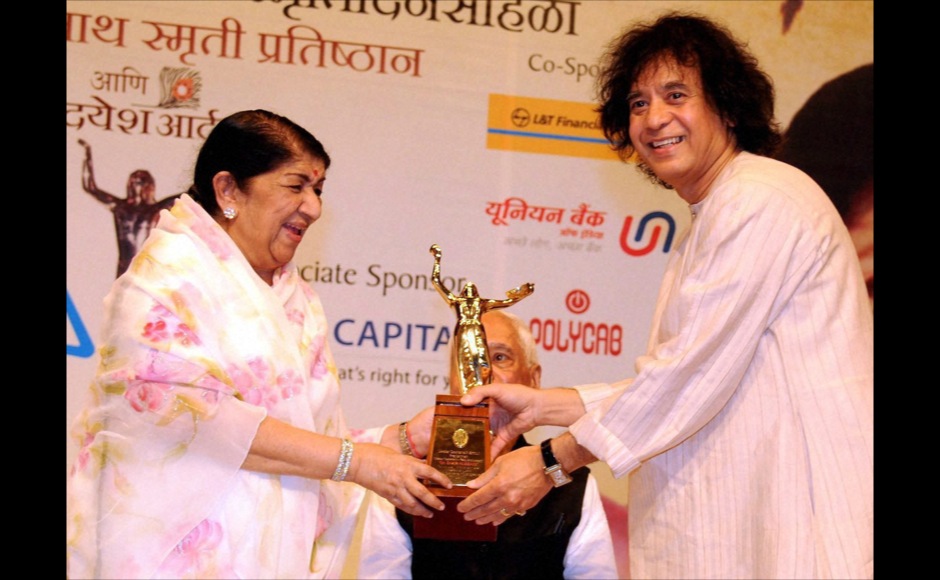 Photos: Zakir Hussain, Anna awarded by Lata Mangeshkar Photos: Zakir Hussain, Anna awarded by Lata Mangeshkar
