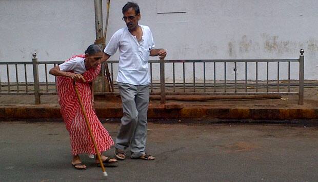 82-year-old Kamal Kathe steps out to vote at the Bal Mohan school in Dadar. If this doesn't inspire you few things might to vote. Parag Shinde/ Firstpost