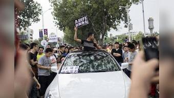 China city acknowledges protesters hurt in rally against chemical plant