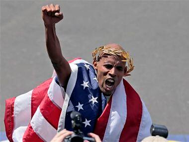 Meb Keflezighi, of San Diego, Calif., celebrates his victory in the 118th Boston Marathon. AP