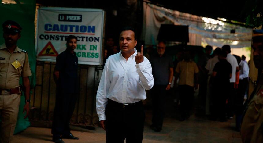 Reliance Communications chief Anil Ambani casts vote at Somani School, Cuffe Parade. Photo: Mexy Xavier 