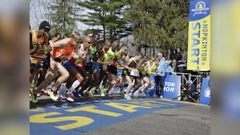 Thousands run Boston Marathon in show of defiance