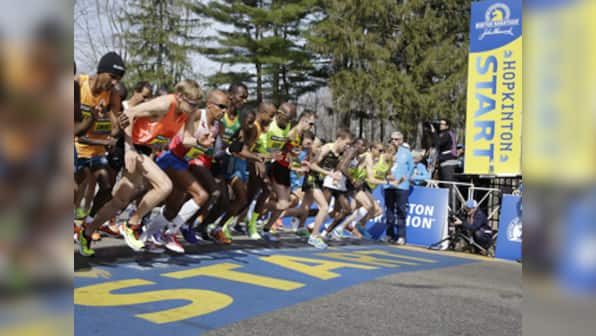 Thousands run Boston Marathon in show of defiance
