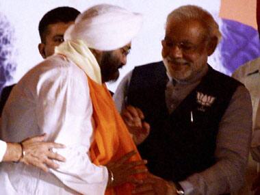 Narendra Modi welcomes Daljit Singh Kohli into the BJP. PTI
