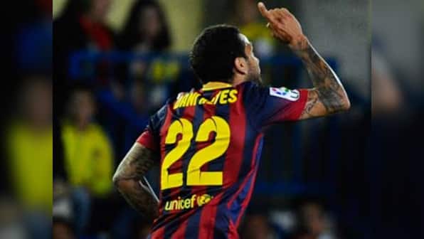 Watch: Dani Alves' classic reaction to banana throwing racist fan