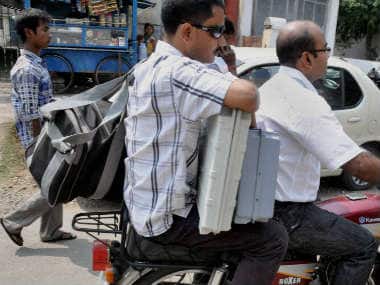 EVM machines being transported in Tripura. PTI