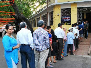 Voters standing in line in Goa. AFP 