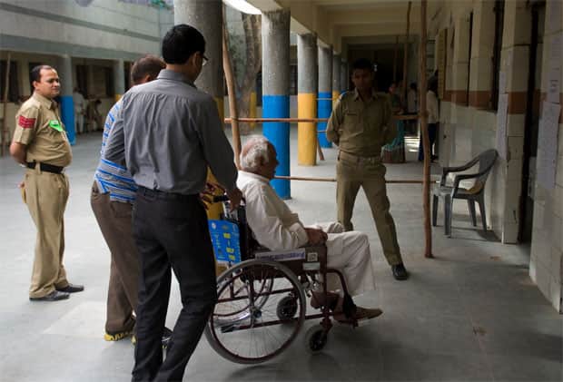 A handicapped voter exercises his franchise in Delhi: Naresh Sharma/Firstpost