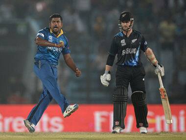 Rangana Herath of Sri Lanka celebrates dismissing Luke Ronchi of New Zealand during the ICC World Twenty20 Bangladesh 2014 Group 1 match between Sri Lanka and New Zealand. Getty Images