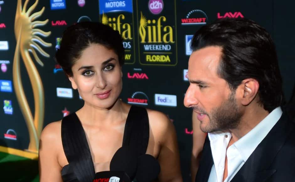 Kareena Kapoor Khan looked beautiful in a black gown and smoky eyes as she stood with husband and actor Saif Ali Khan on the red carpet. AFP
