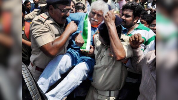 Madhusudan Mistry arrested for vandalising Modi posters in Vadodara