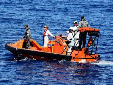 Give us credible proof that flight MH370 crashed, say relatives