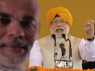 Narendra Modi wearing a Sikh turban at a rally in Jagraon in Ludhiana,  Reuters 