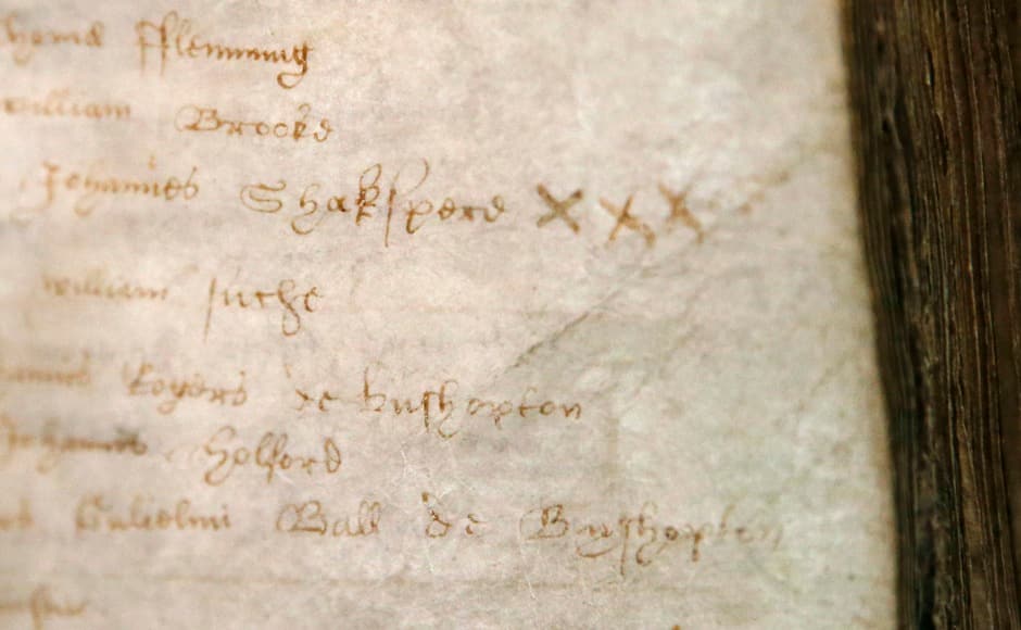 The original registry of William Shakespeare's baptism (third line from top) is displayed after a service commemorating him at Holy Trinity Church, where he was baptised and buried, marking the 450th anniversary of Shakespeare's birth in Stratford-upon-Avon, southern England April 27, 2014. Shakespeare's birthplace of Stratford-upon-Avon is hosting a weekend of festivities in celebration of their famous son who was regarded as England's greatest playwright. REUTERS/Suzanne Plunkett