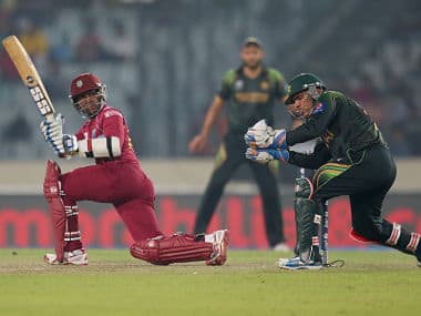  Denesh Ramdin of the West Indies bats as Kamran Akmal of Pakistan looks on during the ICC World Twenty20 Bangladesh 2014 match between West Indies and Pakistan. Getty Images 