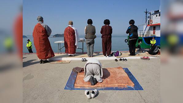 Cries of anguish as South Korea ferry death toll reaches 130