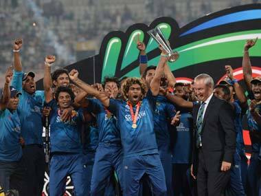 A victorious Sri Lanka with the World T20 trophy. AFP