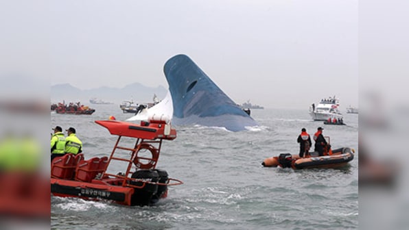 South Korean ferry disaster: Divers spot 3 bodies, captain arrested