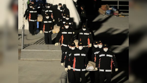 S-Korea ferry death toll hits 146, search for missing gets tougher