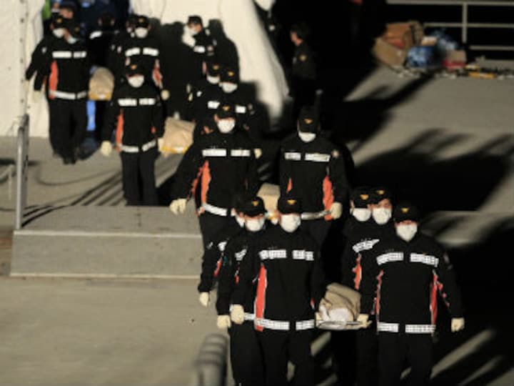 S-Korea ferry death toll hits 146, search for missing gets tougher