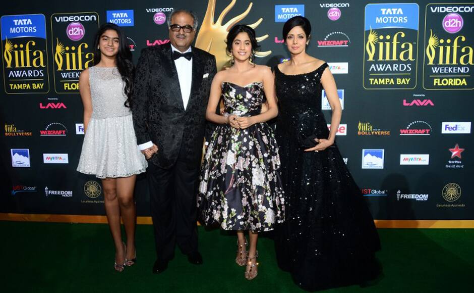 Boney Kapoor and wife Sridevi strike a pose with their daughters Jahanvi and Khushi on the red carpet. AFP.