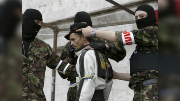 Ukraine, Russia trade blame after deadly gun battle in east