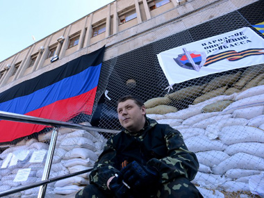 Ukraine crisis: Russia says Kiev will face justice for 'bloody crime' Ukraine crisis: Russia says Kiev will face justice for 'bloody crime'