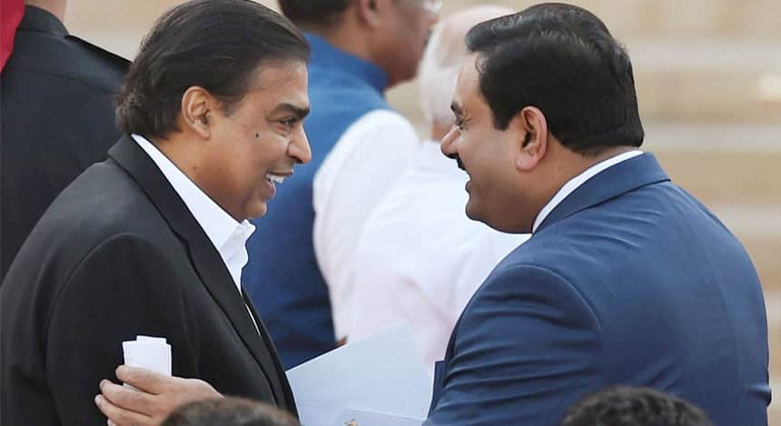 Industrilaists Mukesh Ambani and Gautam Adani at the swearing-in ceremony of the NDA government at Rashtrapati Bhavan in New Delhi on Monday. PTI