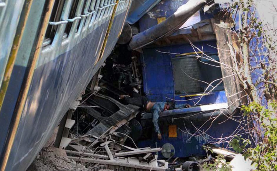 A scene at the site of accident where the passenger train derailed. The incident took place in Raighad district on Sunday. PTI A scene at the site of accident where the passenger train derailed. The incident took place in Raighad district on Sunday. PTI