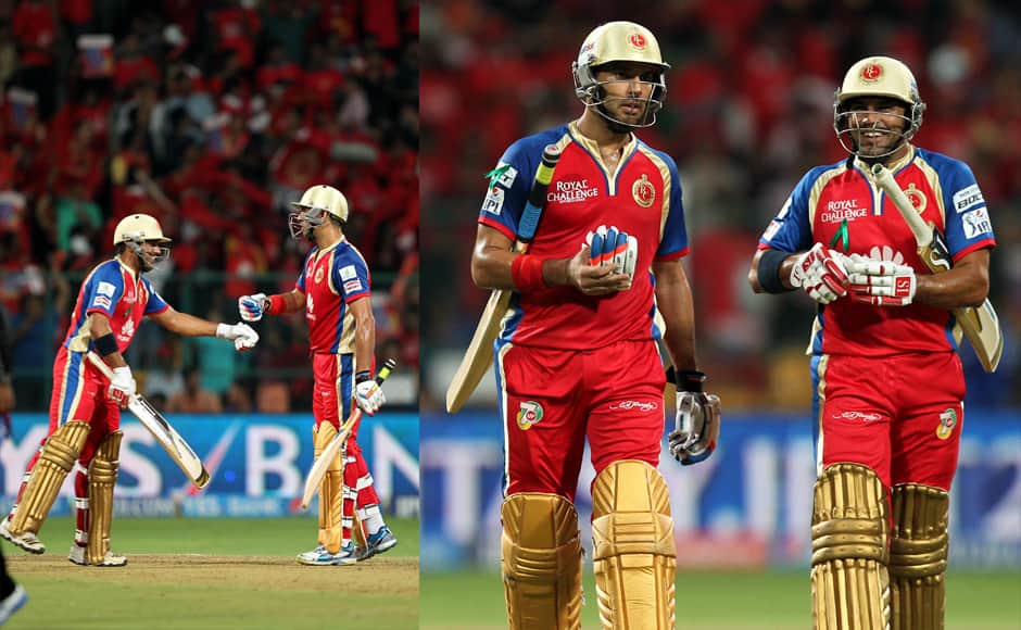 Sachin Rana and Yuvraj Singh of the Royal Challengers Banglore during match 38 of the Pepsi Indian Premier League Season 2014 between the Royal Challengers Bangalore and the Delhi Daredevils held at the M. Chinnaswamy Stadium, Bangalore, India on the 13th May 2014Photo by Prashant Bhoot / IPL / SPORTZPICS
