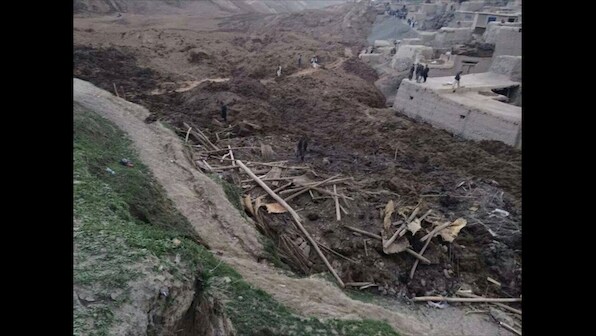 Photos: Rescuers struggle to help Afghans hit by landslide